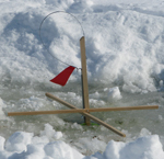 Set tip-up fishing through the ice