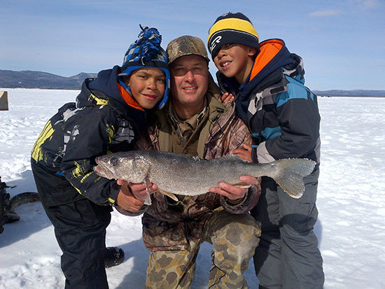 A group icefishing