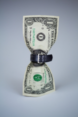 Tighten belt on dollar concept