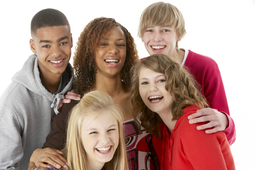 Group of smiling teenagers