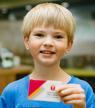 kid with card