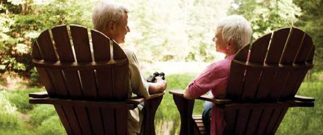 couple relaxing in patio chairs