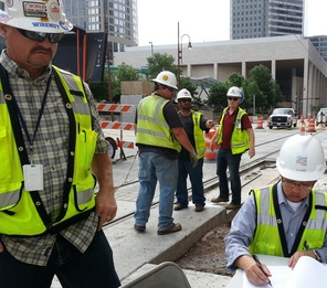 METRO's Kai Zhao looks over signal tests on downtown rail expansion.