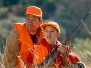 father and son in orange 