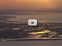 aerial view: sunset over a coastal estuary