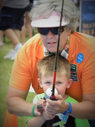 Boy fishing with Texas Parks and Wildlife.