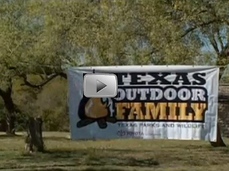 Texas Outdoor Family banner hanging in park
