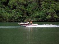 speed boat on lake