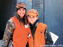 author and son in camo, smiling