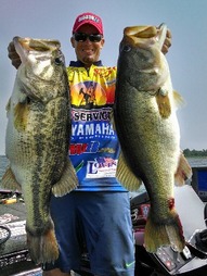 Angler Keith Combs holding 2 huge bass