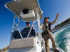 Game wardens on boat