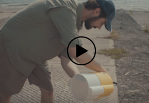 man draining bait bucket, video link