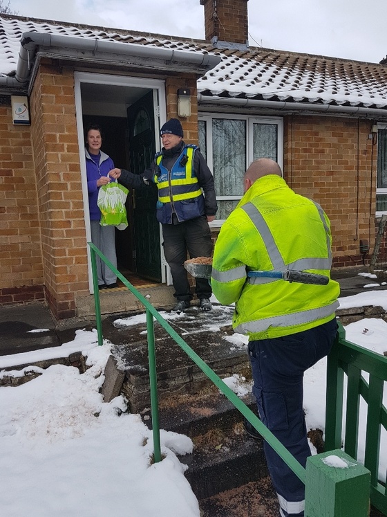 wardens helping people at home