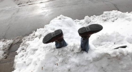 boots upside down in snow