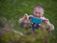 Gardener, writer and broadcaster Toby Buckland photographing unusual plants
