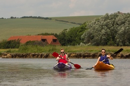 sit on top kayaks on the menanders, centre in background