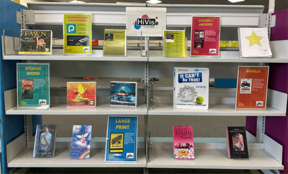 Image of dispaly of audio and large print books at Dewsbury Library
