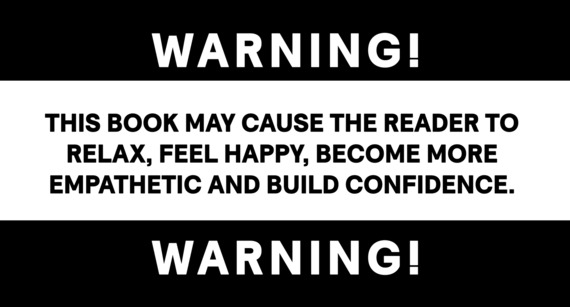 Warning sticker. Reads this book may couse the reder to relax, feel happy, become more empathetic and build confidence.