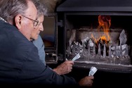 elderly couple burning money fuel poverty