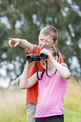 Children birdwatching with binoculars