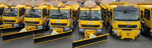 Photograph of gritters with snow ploughs
