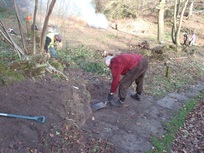 Volunteer unearths stone path to cottage