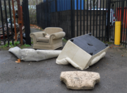 fly tipped sofa