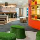 Canolfan ddiogelwch TG newydd Alert Logic yn agor yng Nghaerdydd