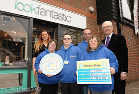 Staff and people with learning difficulties outside a new Safeplace