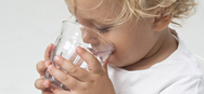 Clean Water - Toddler Drinking from a Glass