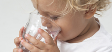 Clean Water - Toddler Drinking from a Glass