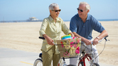elder couple riding bikes