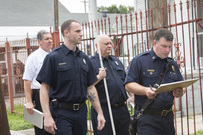 Firefighters canvassing neighborhood