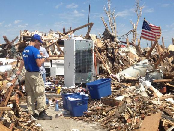 Moore, Okla., May 23, 2013 -- FEMA Corps members were registering families who had lost everything following the deadly tornado which hit Moore, Ok