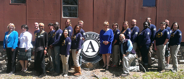 Wendy Spencer, CEO of CNCS, visits AmeriCorps members at a leadership development and team-building camp program in Little Rock, AR.