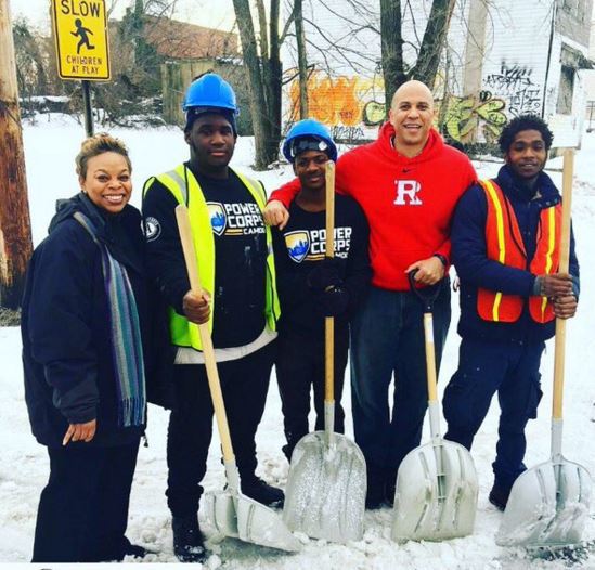 Senator Booker and Mayor Camden shovel snow with AmeriCorps members after Snowstorm Jonas