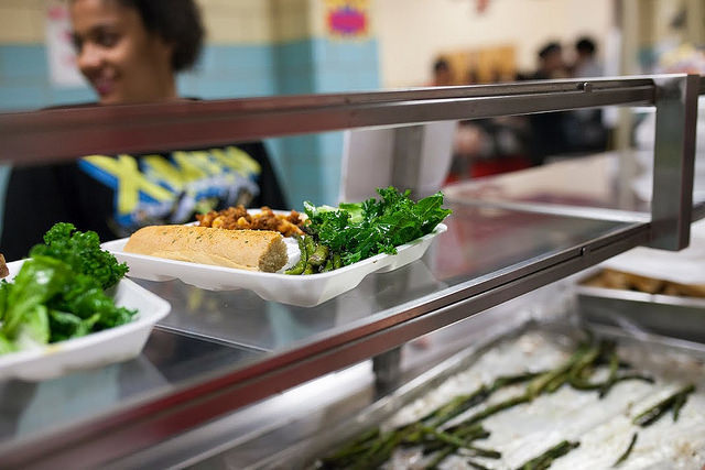 A students’ favorite: stir-fried ginger chicken with locally grown kale.