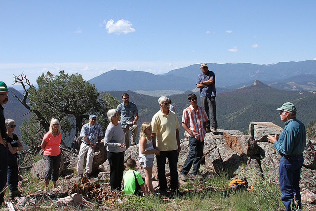 U.S. Forest Service Research Wildlife Biologist Dr. Richard Reynolds talks with a group of land owners and land managers about the benefits of pondero