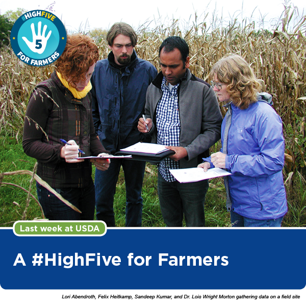 Lori Abendroth, Felix Heitkamp, Sandeep Kumar, and Dr. Lois Wright Morton gathering data on a field site