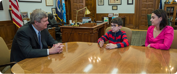 Agriculture Secretary Tom Vilsack meets with Braeden Mannering