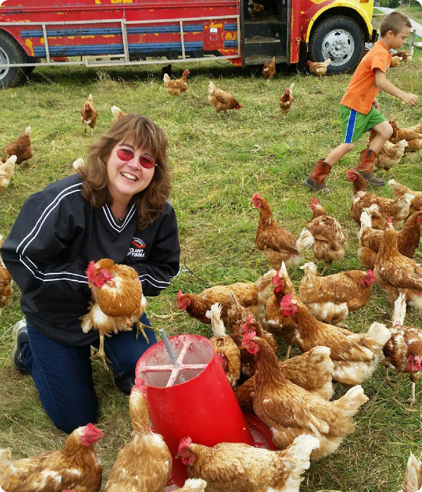 A woman with hens