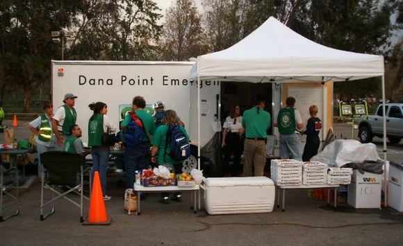 Orange County CMAP volunteers set up a food distribution station during a recent activation.