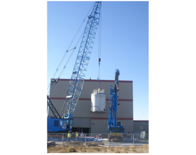 The Pulse Jet Mixing (PJM) Control Test Vessel is lifted into the Full-Scale Test Facility.