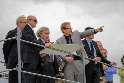 TF Assistant Manager Tom Fletcher points out C Farm activity to Energy Secretary Ernest Moniz