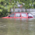 car buried in water