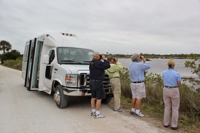 Refuge visitors use the bus to access scenic areas along Black Point Wildlife Drive, Merritt Island NWR. 