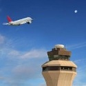airplane and air traffic control tower