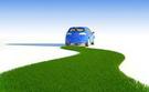 A concept image for fuel efficient cars, showing a small car with a road of green grass behind it.