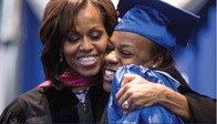 Mrs. Obama congratulates a graduate