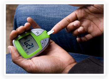 A person with diabetes tests blood sugar
